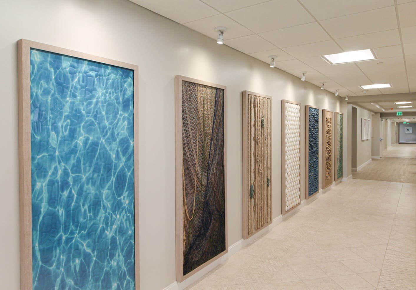 Sensory artwork display featuring tactile art panels in a memory care space that serves seniors who struggle with Alzheimer's and other forms of dementia