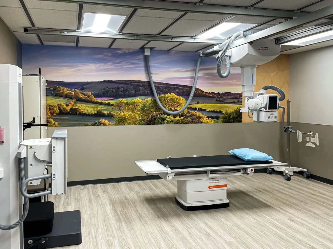 imaging-clinic-wall-graphic-web A healthcare imaging clinic suite features decorative wall graphics instead of traditional artwork.