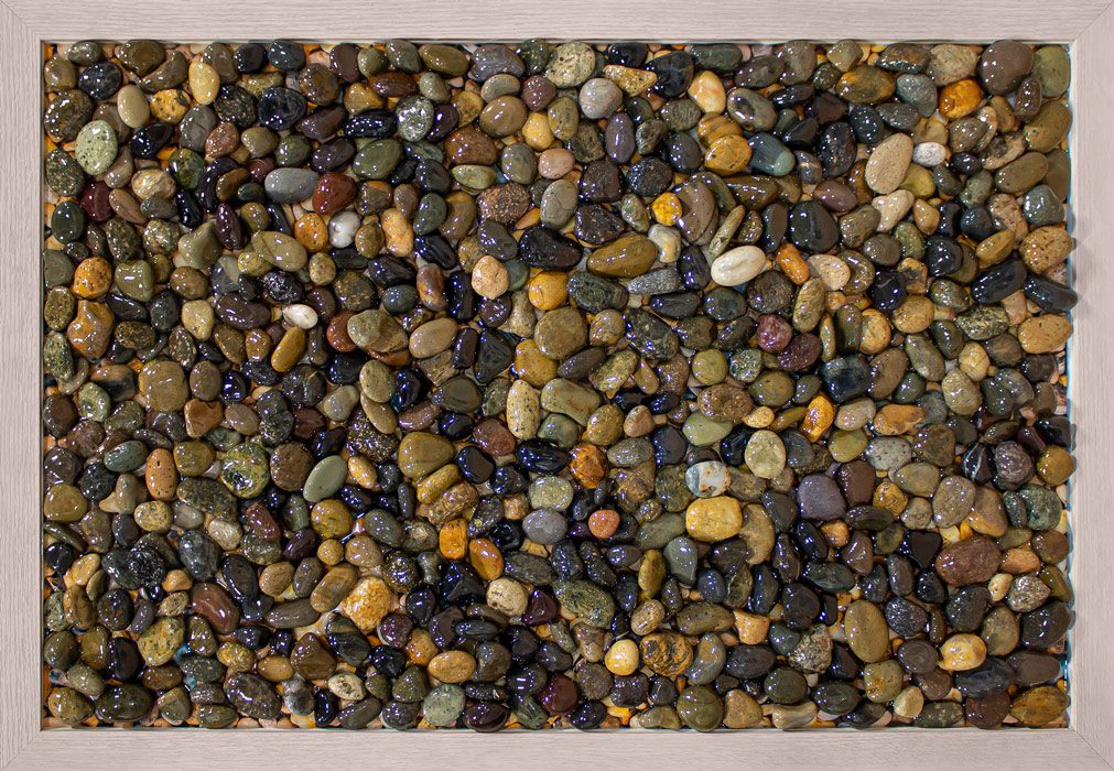 solera-tactile-art-photo-rocks Custom tactile art featuring smooth pebbles resembles Lake Michigan stones, sparking memories and reflection among memory care residents.