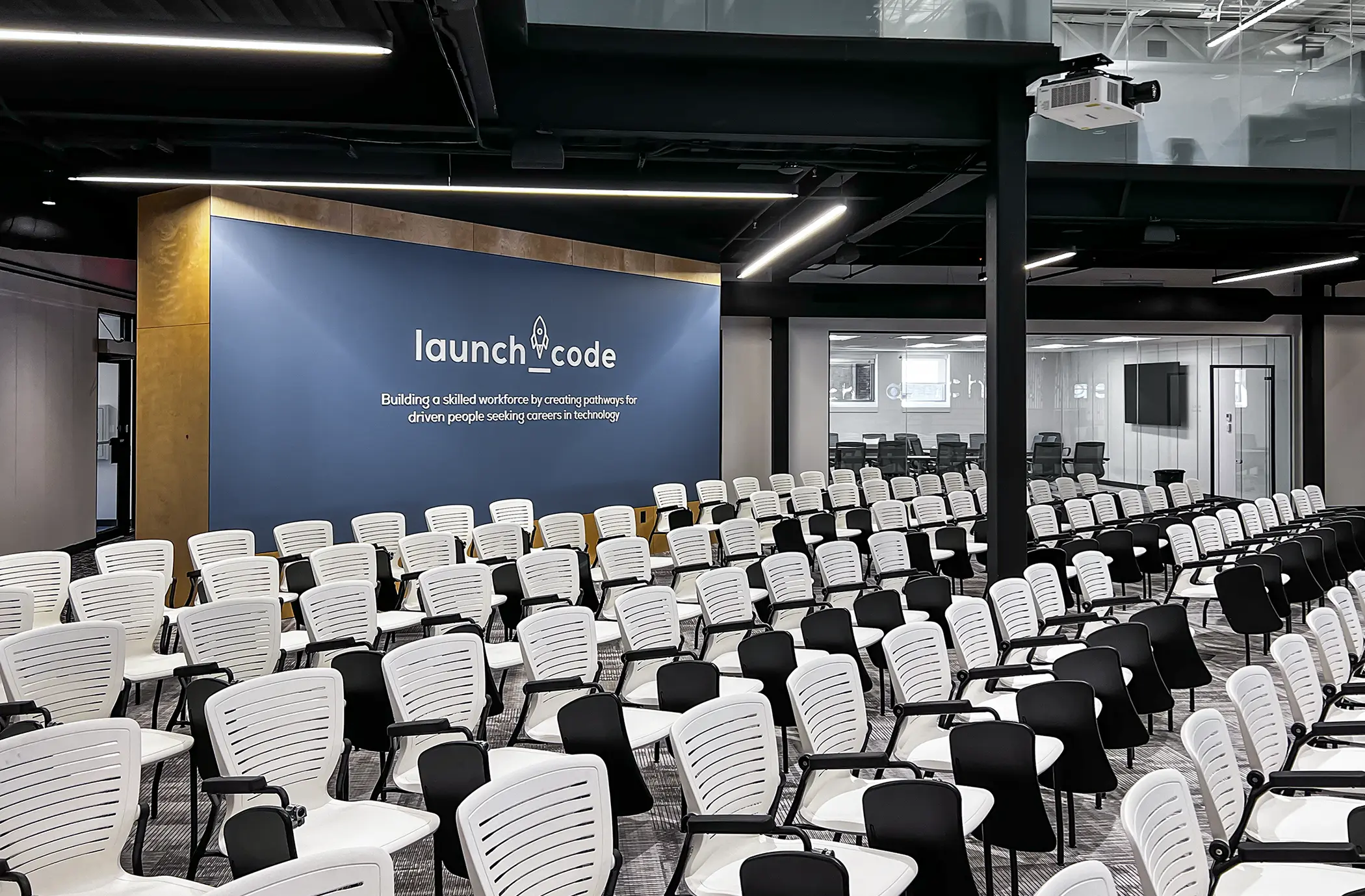 A branded environment featuring a custom logo and dimensional lettering to communicate the company mission statement.