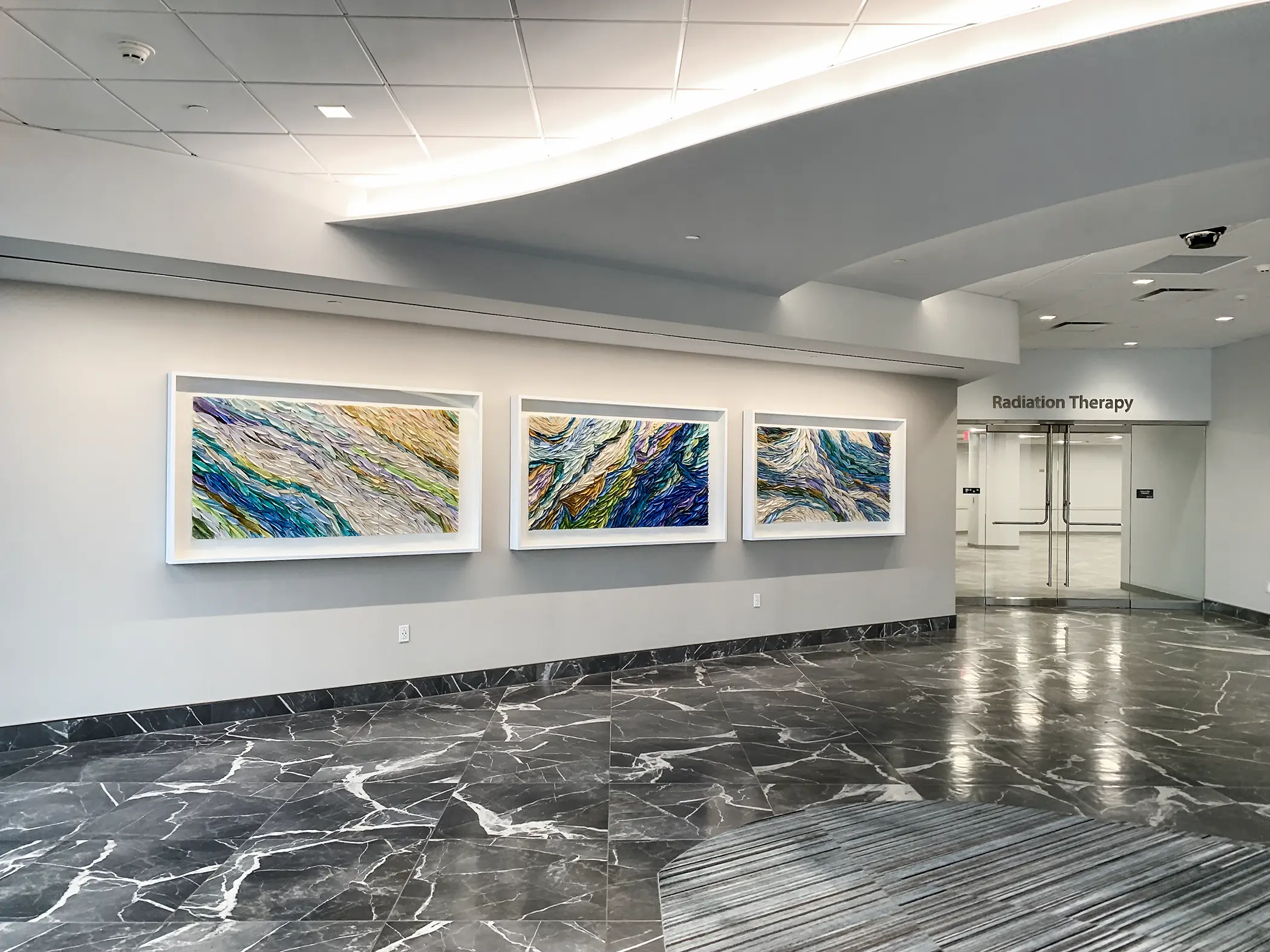 Local commissioned art creates a captivating focal point at a cancer treatment center.
