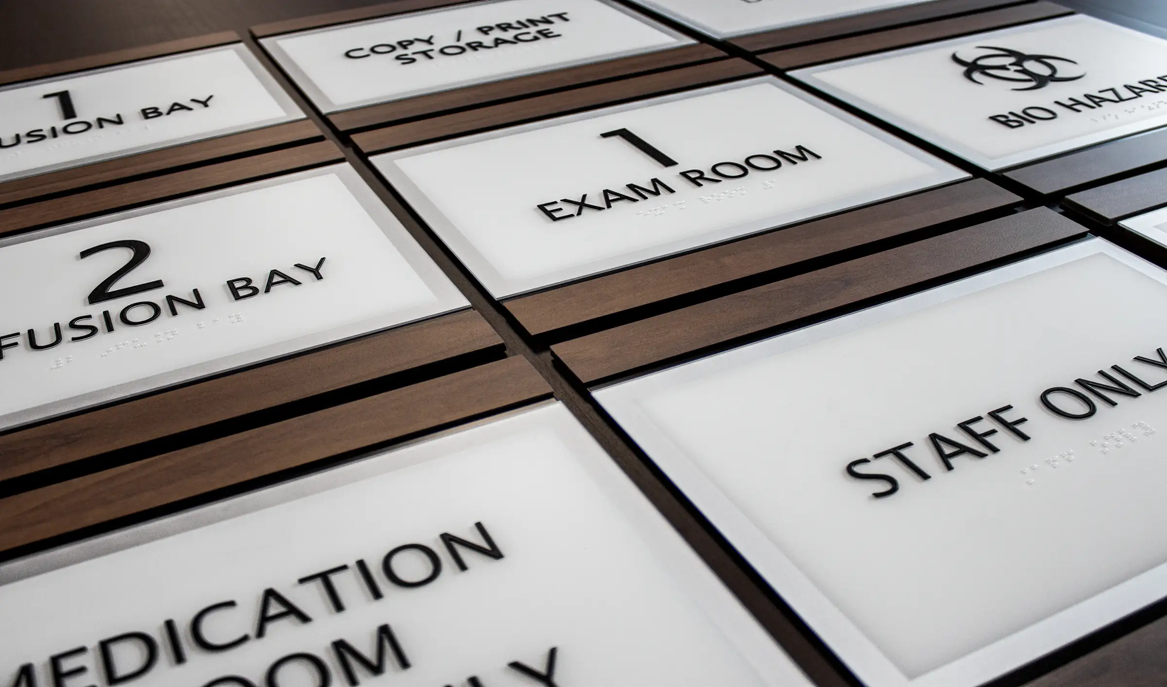 Custom ADA signage with braille from ARCH Design signage company.