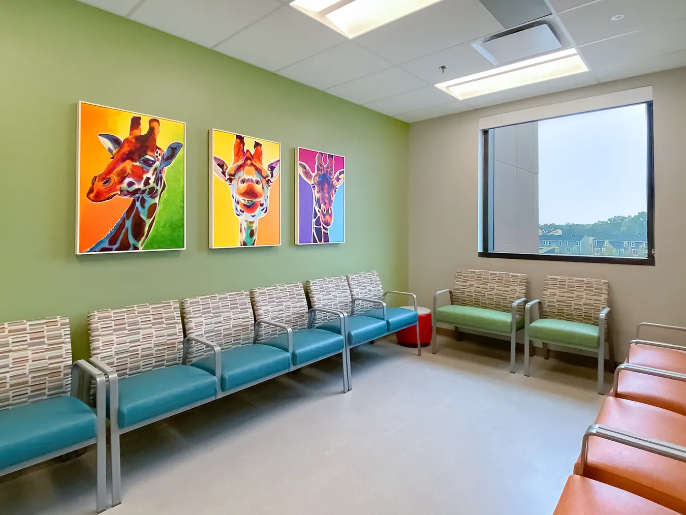 Acoustic artwork in a pediatric waiting area helps reduce noise, creating a less stressful environment for children and families.